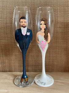 Pair of Handpainted champagne glasses with a portrait of the bride on one and a groom portrait on the other 